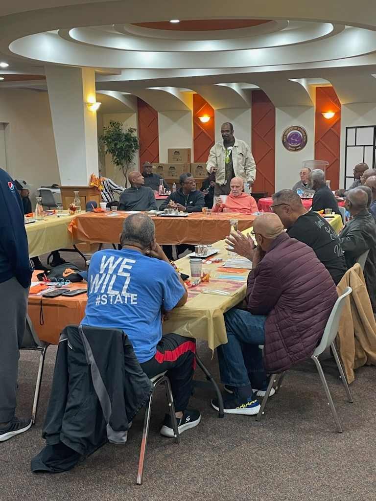 Men gathered for The Man Cave breakfast